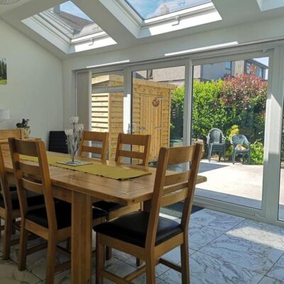 Interior of a single storey extension used as a dining room, designed by MHM Design Ltd.