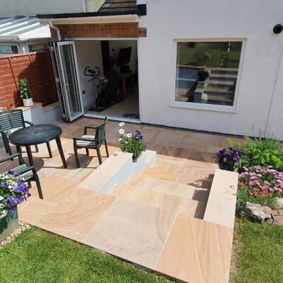 Modern landscaping and garage conversion into a living space designed by MHM Design Ltd.