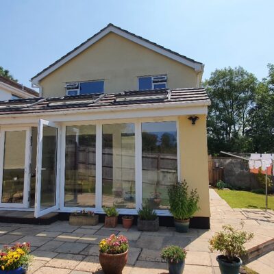 Exterior garden view of a single storey extension with modern skylights windows designed by MHM Design Ltd.